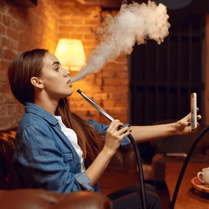 girl enjoying shisha